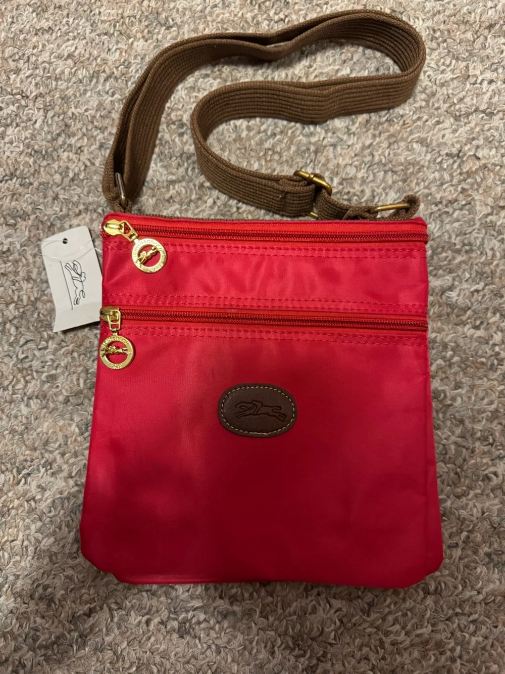 Longchamp Red Crossbody Bag with Brown Strap and Gold Accents